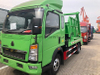 Sinotruk Howo 4x2 Swing Bras Garbage Tamin -5cbm